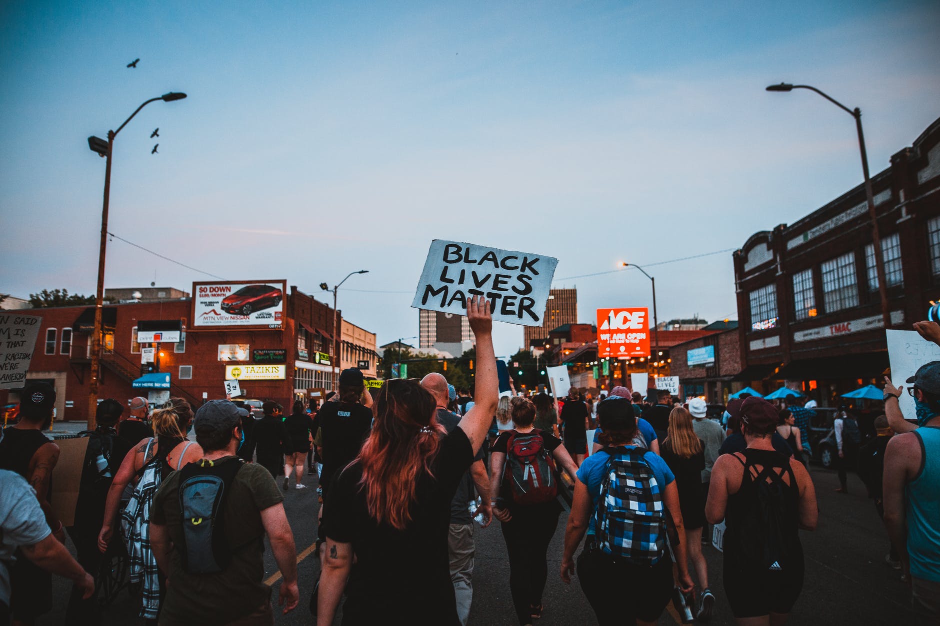 protesters walking on street